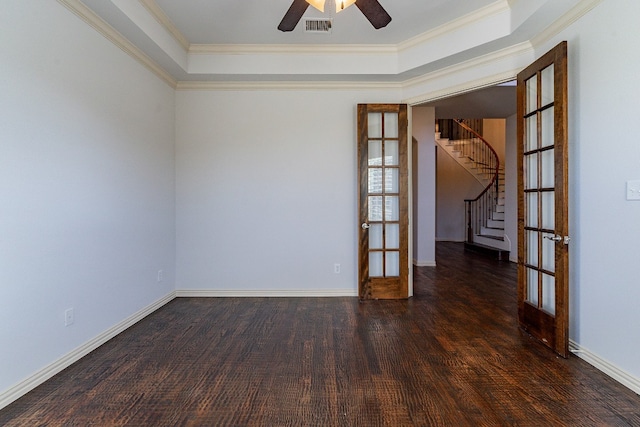 unfurnished room featuring dark hardwood / wood-style flooring, ceiling fan, crown molding, and french doors