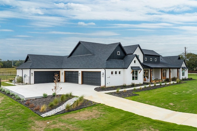 modern farmhouse style home featuring a front lawn, a porch, and a garage