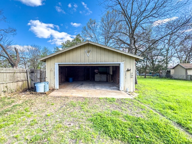 garage featuring a yard