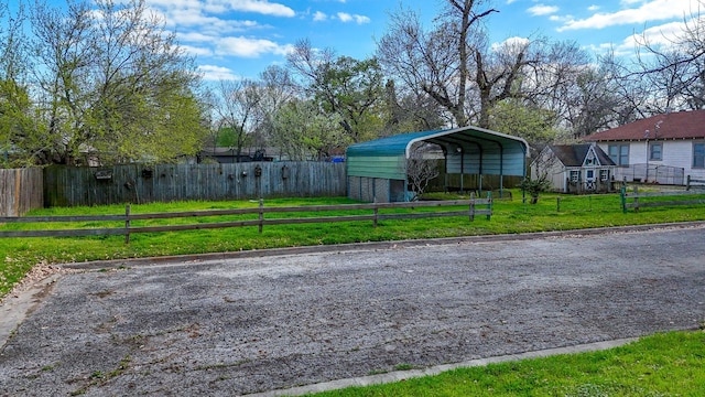 view of yard with a carport