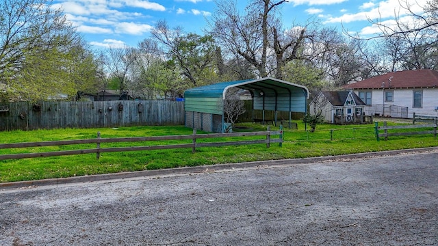 exterior space with a carport