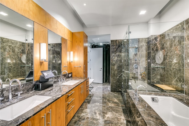 bathroom with shower with separate bathtub and vanity