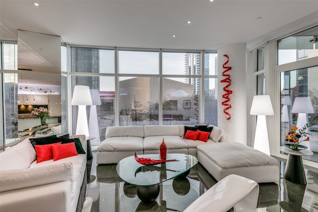 living room featuring a wall of windows