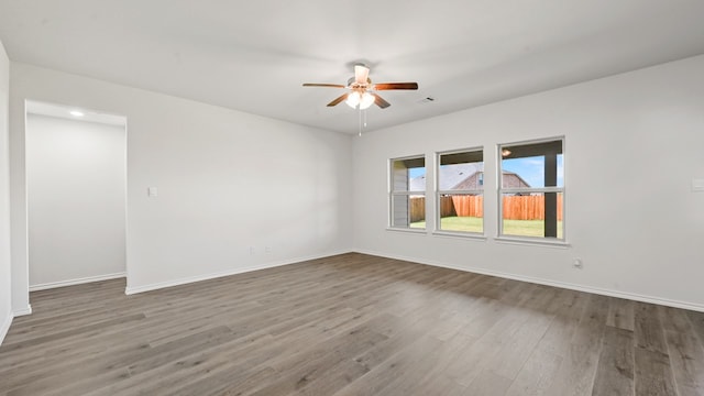 unfurnished room featuring wood-type flooring and ceiling fan