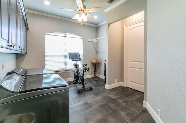 laundry area featuring washing machine and clothes dryer, ceiling fan, cabinets, and ornamental molding