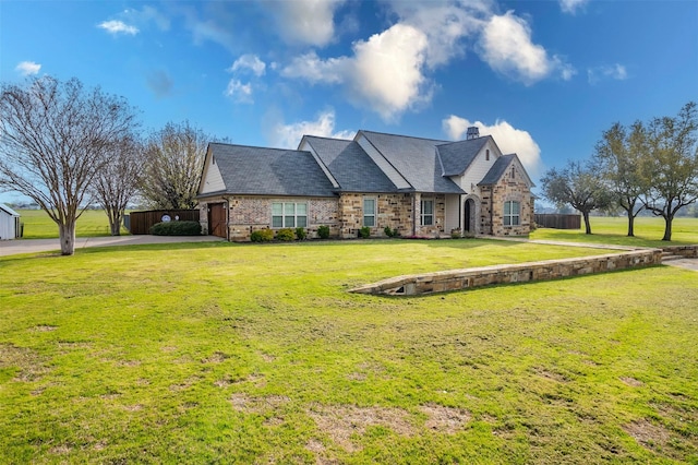 view of front of property with a front yard