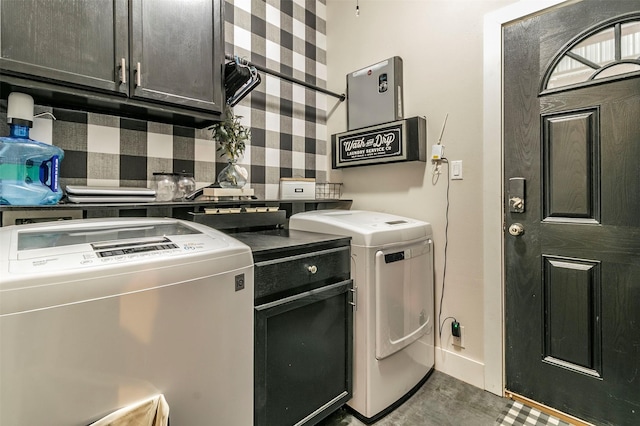 washroom with cabinets and independent washer and dryer