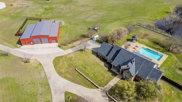 birds eye view of property featuring a rural view