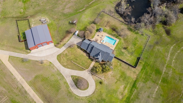 birds eye view of property featuring a rural view