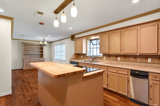 kitchen featuring hanging light fixtures, dark hardwood / wood-style floors, sink, butcher block counters, and a kitchen island