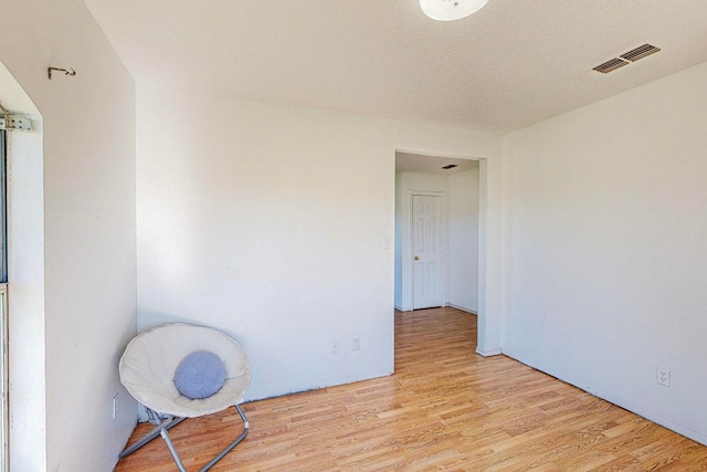 empty room with light wood-type flooring