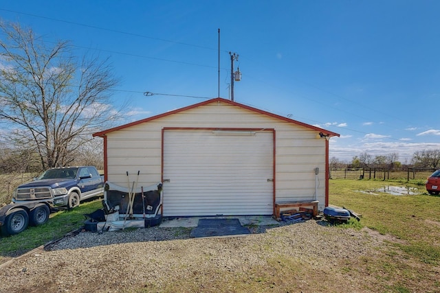 garage with a lawn