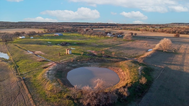 birds eye view of property featuring a rural view