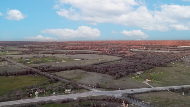 birds eye view of property featuring a rural view