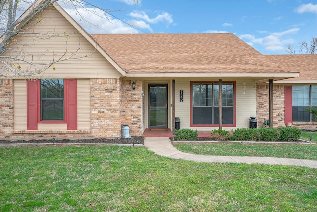 view of front of home with a front yard