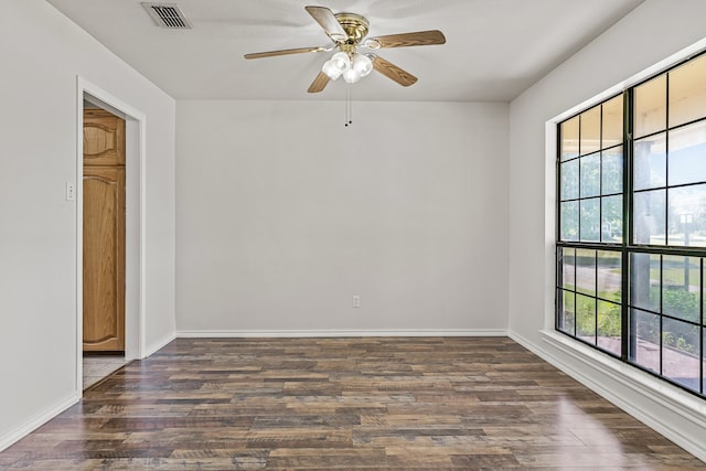 unfurnished room with ceiling fan and hardwood / wood-style floors