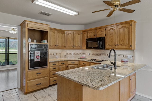 kitchen with black appliances, sink, decorative backsplash, light tile patterned flooring, and ceiling fan