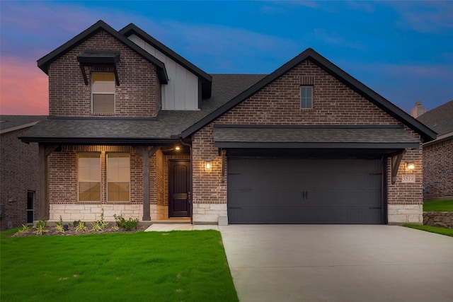 view of front of property with a lawn