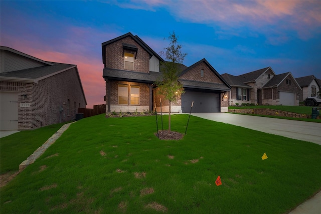 view of front of house with a yard, a garage, and central air condition unit