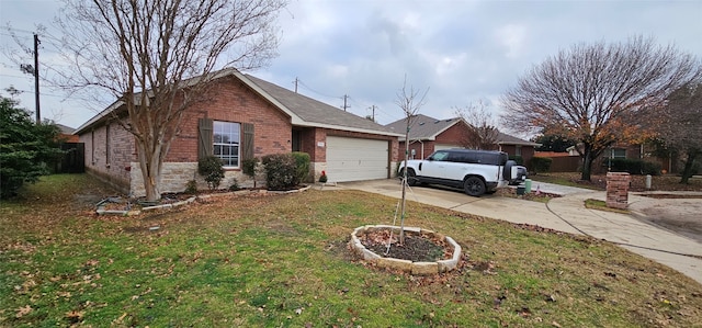 ranch-style house featuring a front yard and a garage