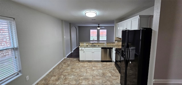 kitchen with ceiling fan, light stone counters, light tile flooring, black appliances, and white cabinetry