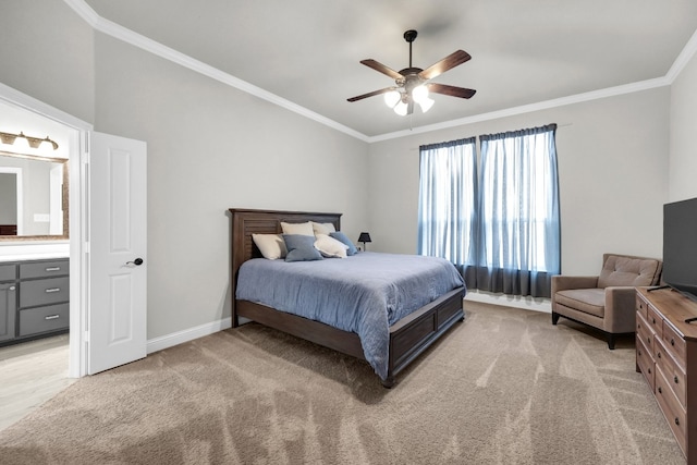 bedroom featuring connected bathroom, ornamental molding, light colored carpet, and ceiling fan