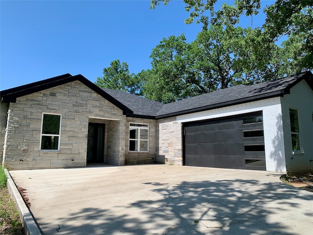 view of front of home featuring a garage