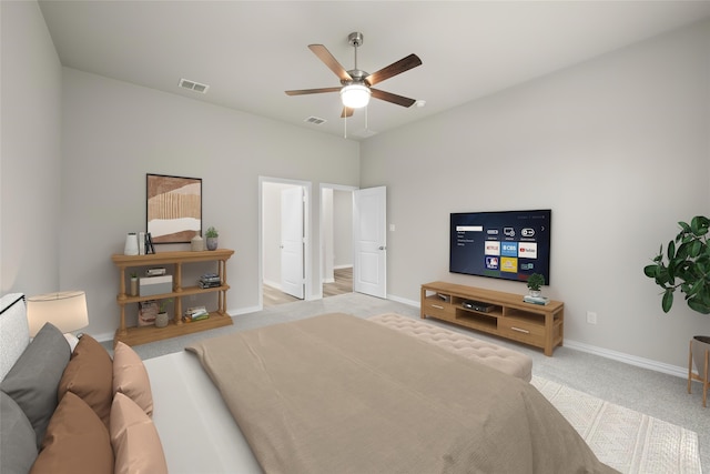 carpeted bedroom featuring ceiling fan