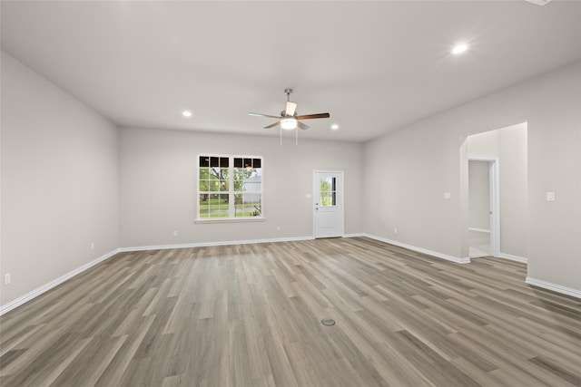 unfurnished room with light hardwood / wood-style floors and ceiling fan