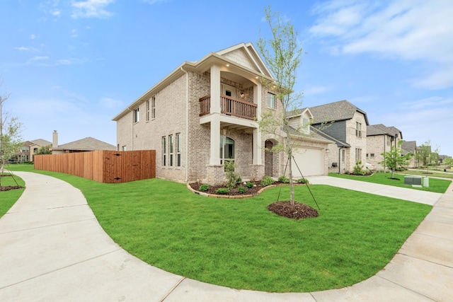 view of front of home featuring a front lawn and a balcony