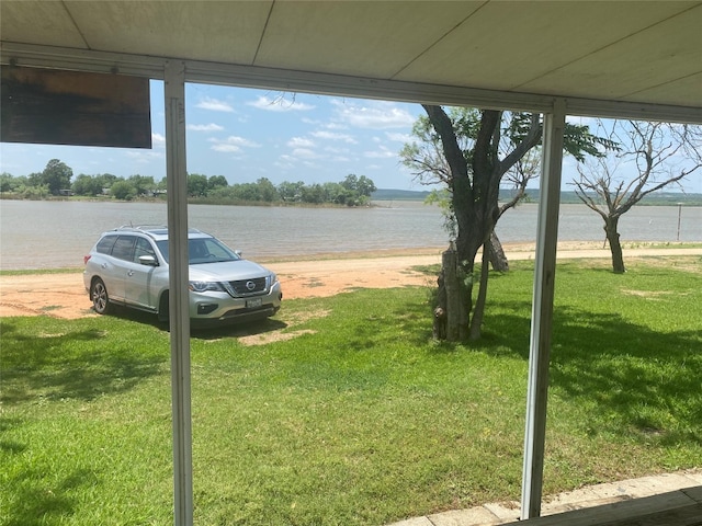 view of yard with a water view