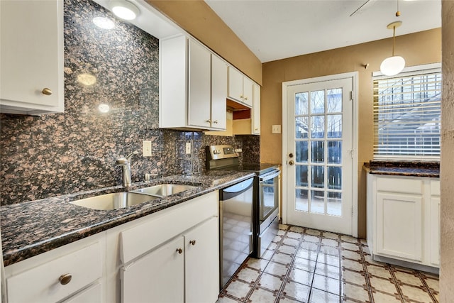 kitchen featuring pendant lighting, white cabinetry, appliances with stainless steel finishes, and sink