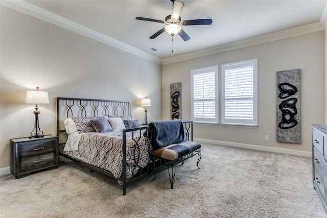 bedroom with ceiling fan, light carpet, and crown molding