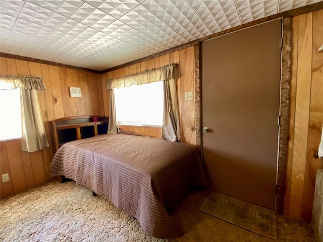 bedroom featuring light carpet