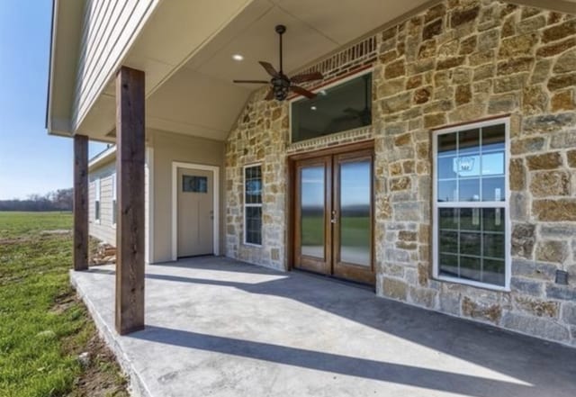 view of patio featuring french doors and ceiling fan