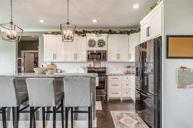 dining area featuring a notable chandelier, ornamental molding, and a healthy amount of sunlight