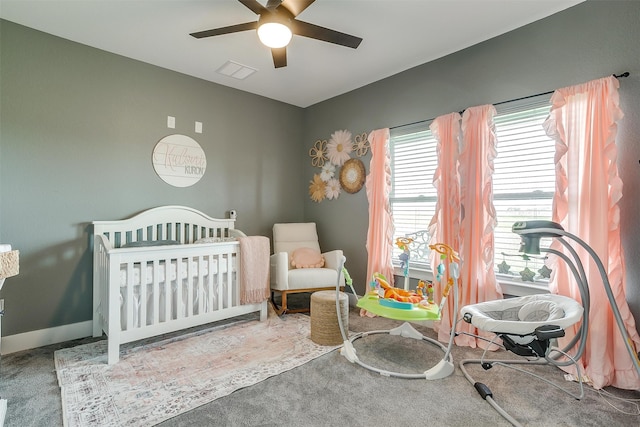 carpeted bedroom with ceiling fan