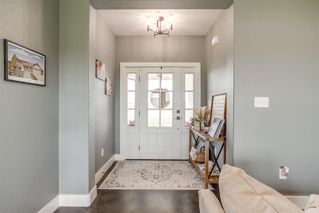 living room featuring a wealth of natural light, a large fireplace, ceiling fan, and crown molding