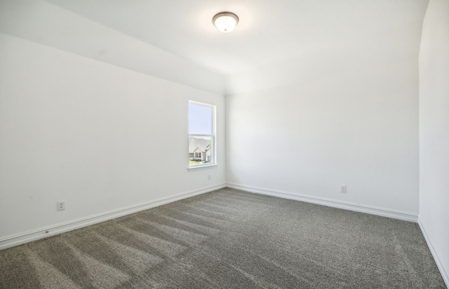 unfurnished room with carpet floors