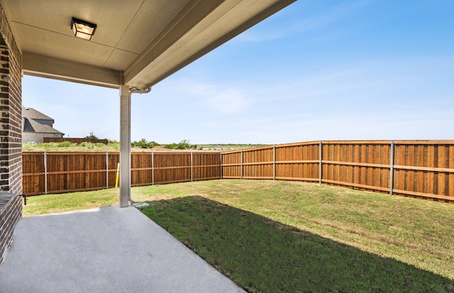 view of yard with a patio area