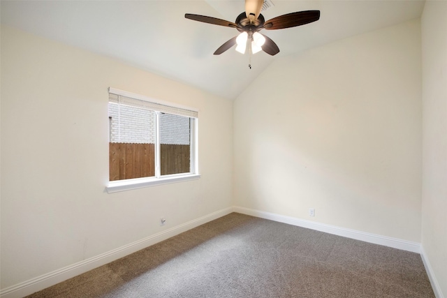 unfurnished room featuring ceiling fan, carpet flooring, and lofted ceiling