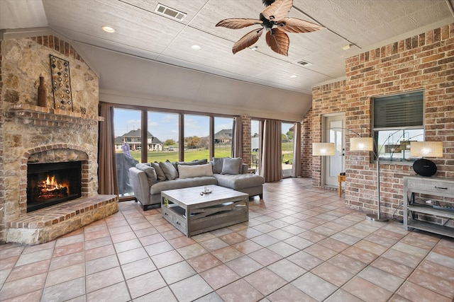 living room featuring a brick fireplace, wooden ceiling, brick wall, and vaulted ceiling