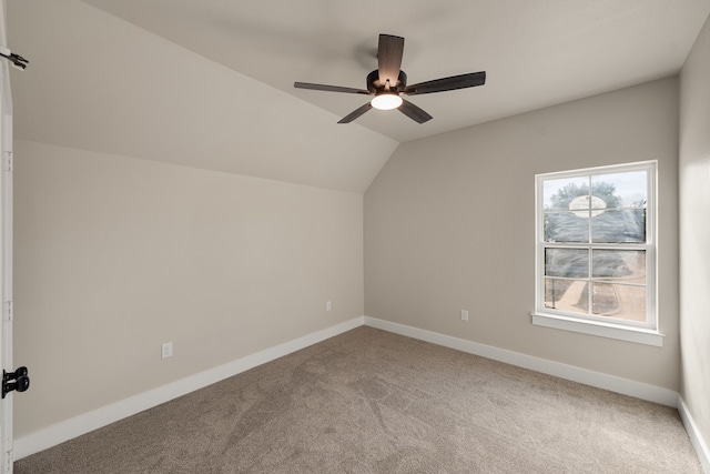 bonus room featuring carpet, lofted ceiling, and ceiling fan