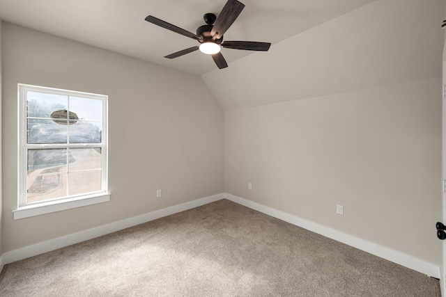 bonus room featuring vaulted ceiling, carpet flooring, and ceiling fan