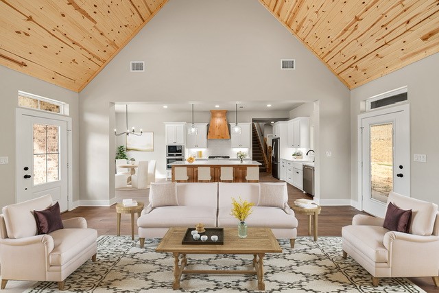 living room featuring wood ceiling, light wood-type flooring, and high vaulted ceiling