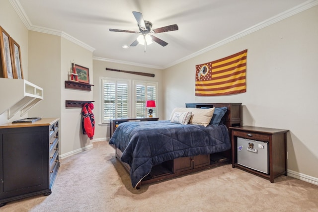 bedroom with ceiling fan, carpet flooring, and ornamental molding