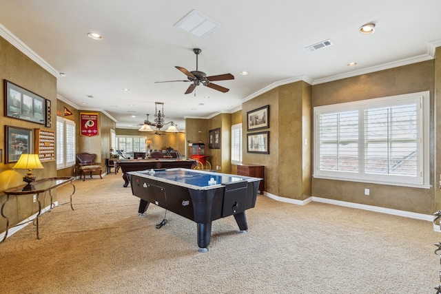 rec room featuring ornamental molding, a wealth of natural light, and light carpet