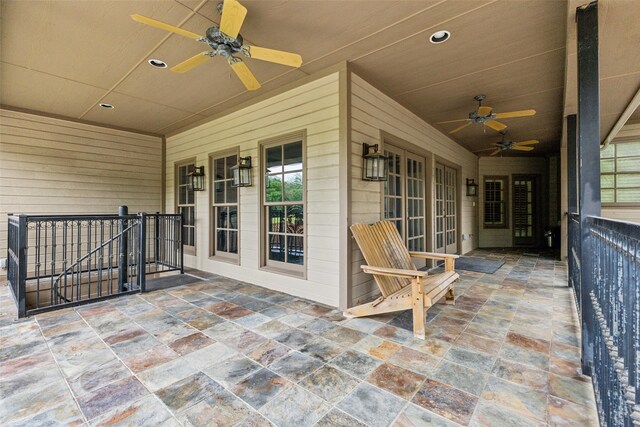 view of patio featuring ceiling fan