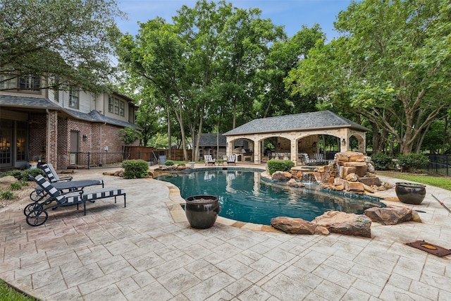 view of swimming pool featuring a patio area