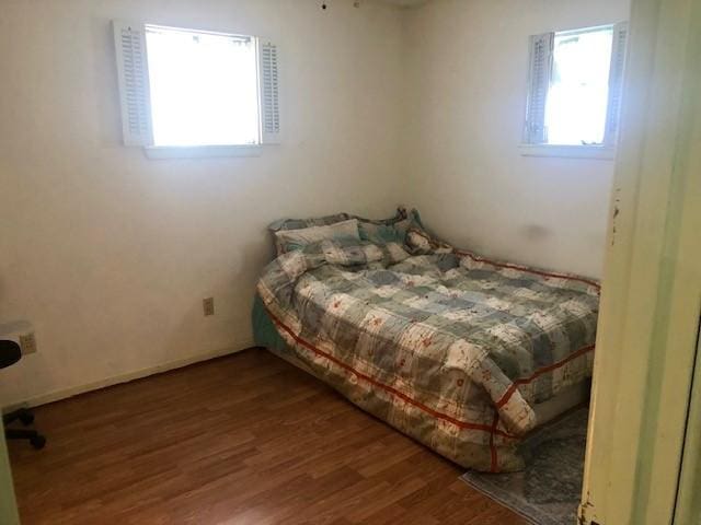 bedroom featuring hardwood / wood-style flooring